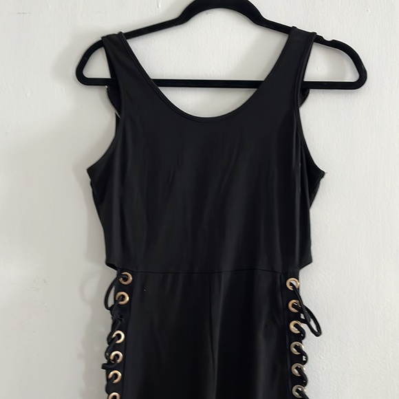 Sexy black jumpsuit with grommets down legs - Picture 2 of 7